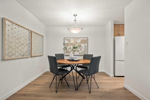 319-723 57 Avenue Sw, Calgary, AB - Indoor Photo Showing Dining Room