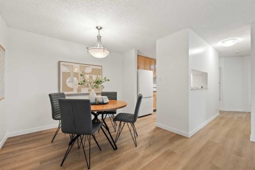 319-723 57 Avenue Sw, Calgary, AB - Indoor Photo Showing Dining Room