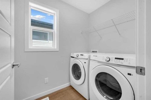 61 Savanna Place Ne, Calgary, AB - Indoor Photo Showing Laundry Room