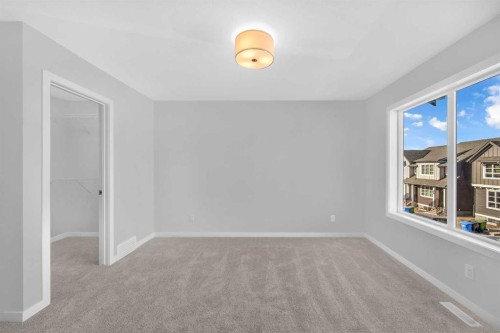 61 Savanna Place Ne, Calgary, AB - Indoor Photo Showing Other Room