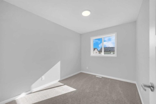 61 Savanna Place Ne, Calgary, AB - Indoor Photo Showing Other Room