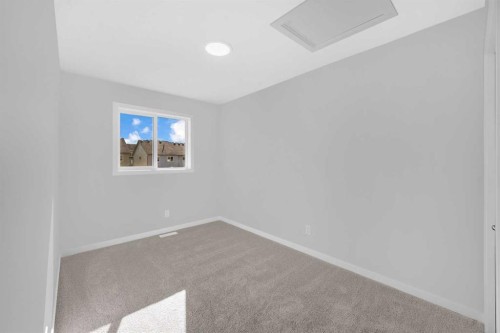 61 Savanna Place Ne, Calgary, AB - Indoor Photo Showing Other Room