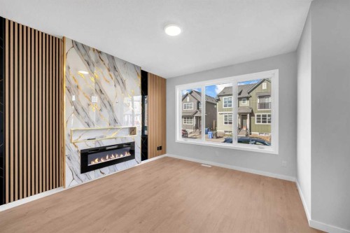 61 Savanna Place Ne, Calgary, AB - Indoor With Fireplace
