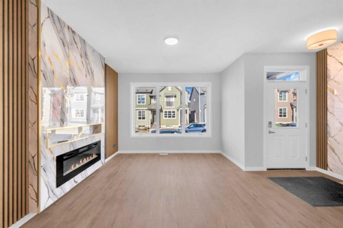 61 Savanna Place Ne, Calgary, AB - Indoor With Fireplace