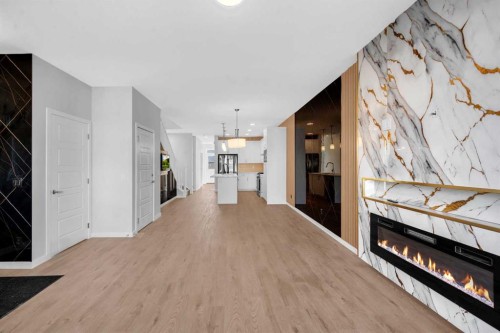 61 Savanna Place Ne, Calgary, AB - Indoor With Fireplace