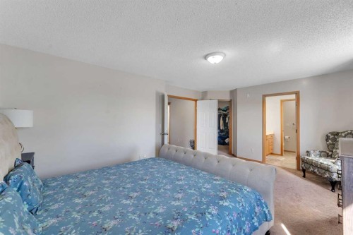 77 Taralea Green Ne, Calgary, AB - Indoor Photo Showing Bedroom