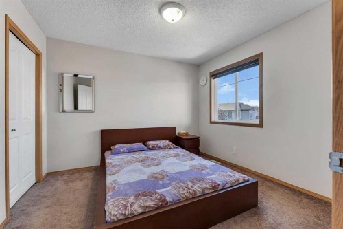 77 Taralea Green Ne, Calgary, AB - Indoor Photo Showing Bedroom