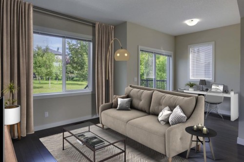 105-300 Marina Drive, Chestermere, AB - Indoor Photo Showing Living Room