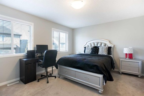158 Osborne Common Sw, Airdrie, AB - Indoor Photo Showing Bedroom