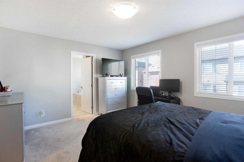 158 Osborne Common Sw, Airdrie, AB - Indoor Photo Showing Bedroom