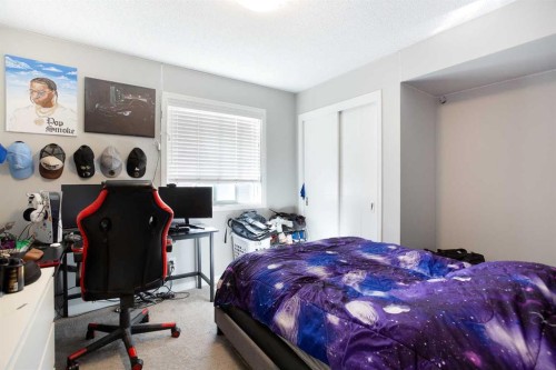 158 Osborne Common Sw, Airdrie, AB - Indoor Photo Showing Bedroom