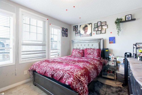 158 Osborne Common Sw, Airdrie, AB - Indoor Photo Showing Bedroom
