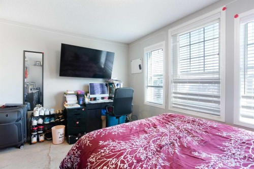 158 Osborne Common Sw, Airdrie, AB - Indoor Photo Showing Bedroom