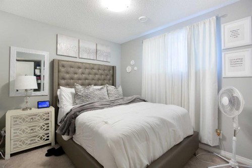 158 Osborne Common Sw, Airdrie, AB - Indoor Photo Showing Bedroom