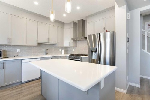 158 Osborne Common Sw, Airdrie, AB - Indoor Photo Showing Kitchen With Stainless Steel Kitchen With Upgraded Kitchen