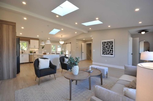 1 Cherovan Drive Sw, Calgary, AB - Indoor Photo Showing Living Room