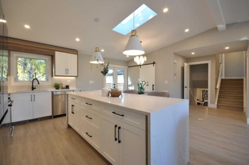 1 Cherovan Drive Sw, Calgary, AB - Indoor Photo Showing Kitchen With Upgraded Kitchen