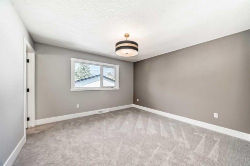 1 Cherovan Drive Sw, Calgary, AB - Indoor Photo Showing Other Room