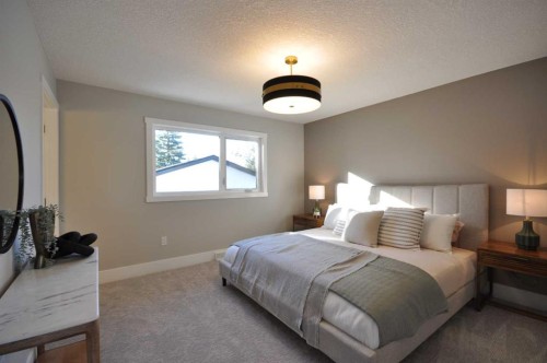1 Cherovan Drive Sw, Calgary, AB - Indoor Photo Showing Bedroom