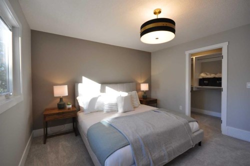 1 Cherovan Drive Sw, Calgary, AB - Indoor Photo Showing Bedroom
