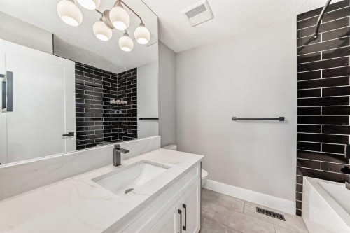 1 Cherovan Drive Sw, Calgary, AB - Indoor Photo Showing Bathroom