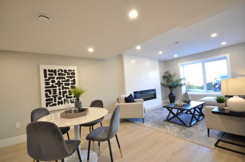 1 Cherovan Drive Sw, Calgary, AB - Indoor With Fireplace