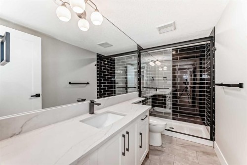 1 Cherovan Drive Sw, Calgary, AB - Indoor Photo Showing Bathroom
