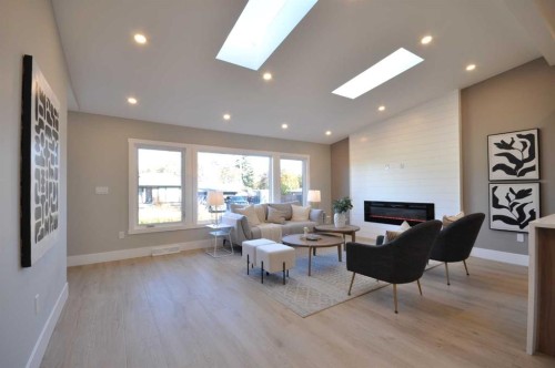 1 Cherovan Drive Sw, Calgary, AB - Indoor With Fireplace