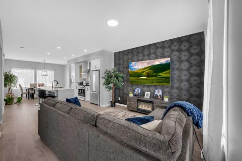 220 Cornerstone Grove Ne, Calgary, AB - Indoor Photo Showing Living Room With Fireplace