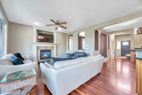89 Springborough Boulevard Sw, Calgary, AB - Indoor Photo Showing Living Room With Fireplace