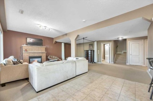89 Springborough Boulevard Sw, Calgary, AB - Indoor With Fireplace