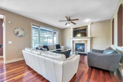 89 Springborough Boulevard Sw, Calgary, AB - Indoor Photo Showing Living Room With Fireplace