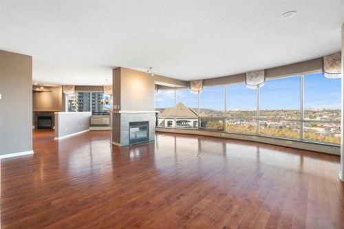 1901-1088 6 Avenue Sw, Calgary, AB - Indoor With Fireplace
