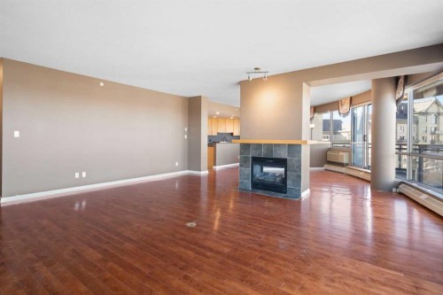 1901-1088 6 Avenue Sw, Calgary, AB - Indoor With Fireplace