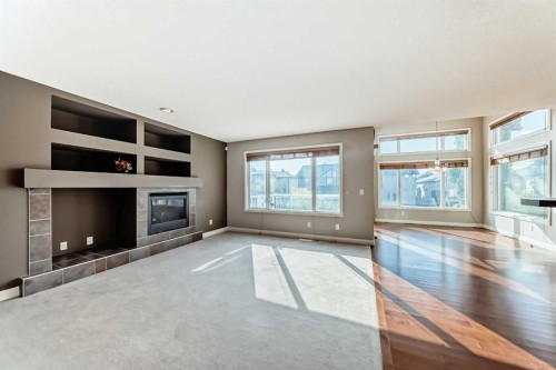 130 Panamount View Nw, Calgary, AB - Indoor With Fireplace