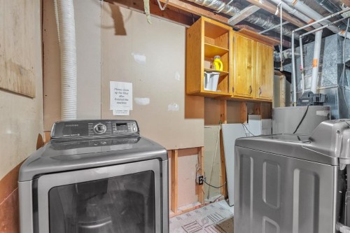 4419 Marlborough Drive Ne, Calgary, AB - Indoor Photo Showing Laundry Room
