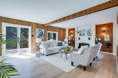 31-29066 Range Road 52, Rural Mountain View County, AB - Indoor Photo Showing Living Room With Fireplace