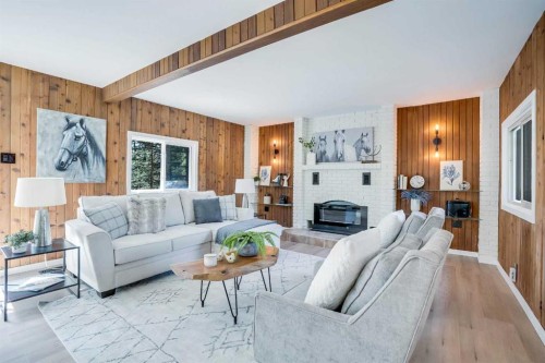 31-29066 Range Road 52, Rural Mountain View County, AB - Indoor Photo Showing Living Room With Fireplace