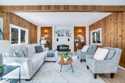 31-29066 Range Road 52, Rural Mountain View County, AB - Indoor Photo Showing Living Room With Fireplace