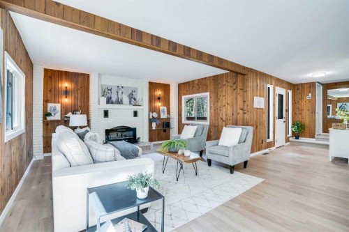 31-29066 Range Road 52, Rural Mountain View County, AB - Indoor Photo Showing Living Room With Fireplace