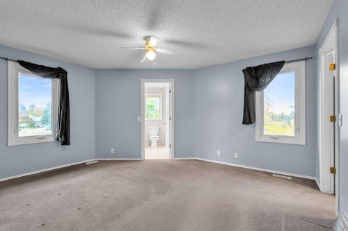 147 Scenic Way Nw, Calgary, AB - Indoor Photo Showing Other Room