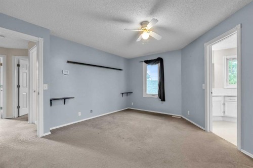 147 Scenic Way Nw, Calgary, AB - Indoor Photo Showing Other Room