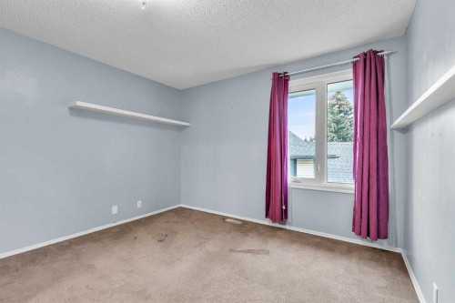 147 Scenic Way Nw, Calgary, AB - Indoor Photo Showing Other Room