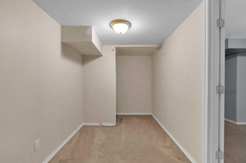 147 Scenic Way Nw, Calgary, AB - Indoor Photo Showing Other Room