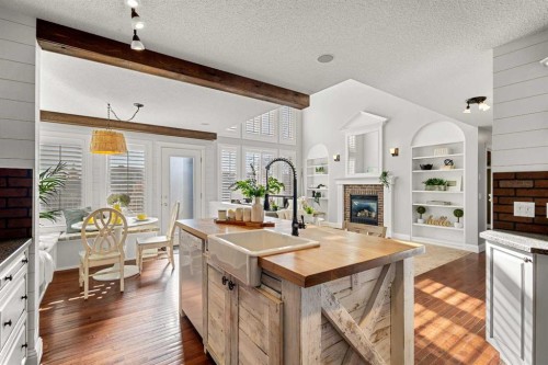 52 Canoe Road Sw, Airdrie, AB - Indoor Photo Showing Kitchen With Upgraded Kitchen