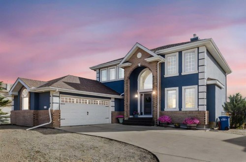 52 Canoe Road Sw, Airdrie, AB - Outdoor With Facade