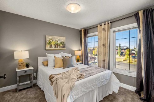 52 Canoe Road Sw, Airdrie, AB - Indoor Photo Showing Bedroom