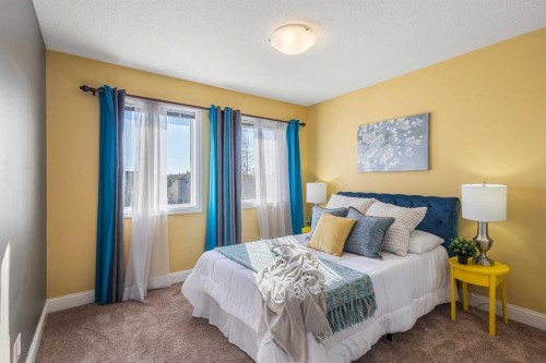 52 Canoe Road Sw, Airdrie, AB - Indoor Photo Showing Bedroom