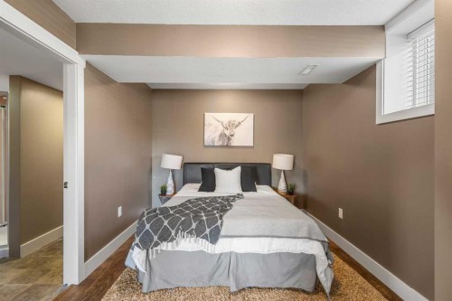 52 Canoe Road Sw, Airdrie, AB - Indoor Photo Showing Bedroom