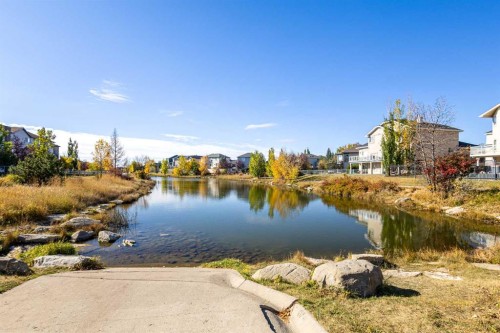 52 Canoe Road Sw, Airdrie, AB - Outdoor With Body Of Water With View